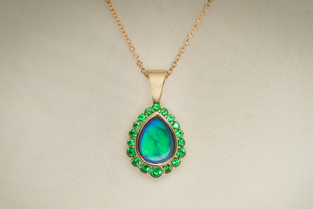 Pear Shaped Black Opal Pendant with Tsavorite Garnet Halo