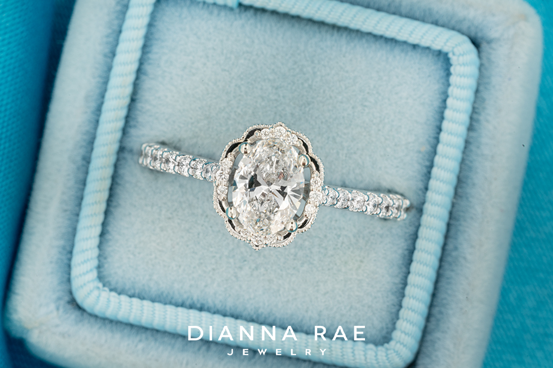 Daisy Blossom - White Gold Oval Halo Engagement Ring