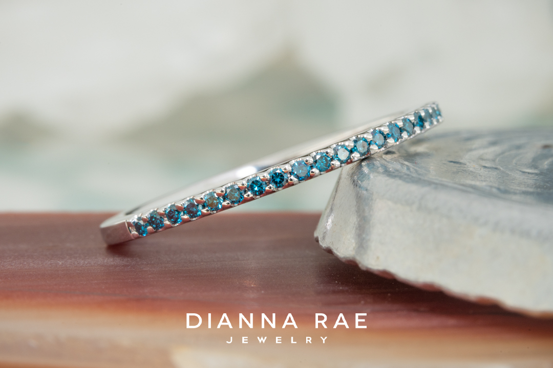 Lady's 14k White Gold band with enhanced Blue Diamonds