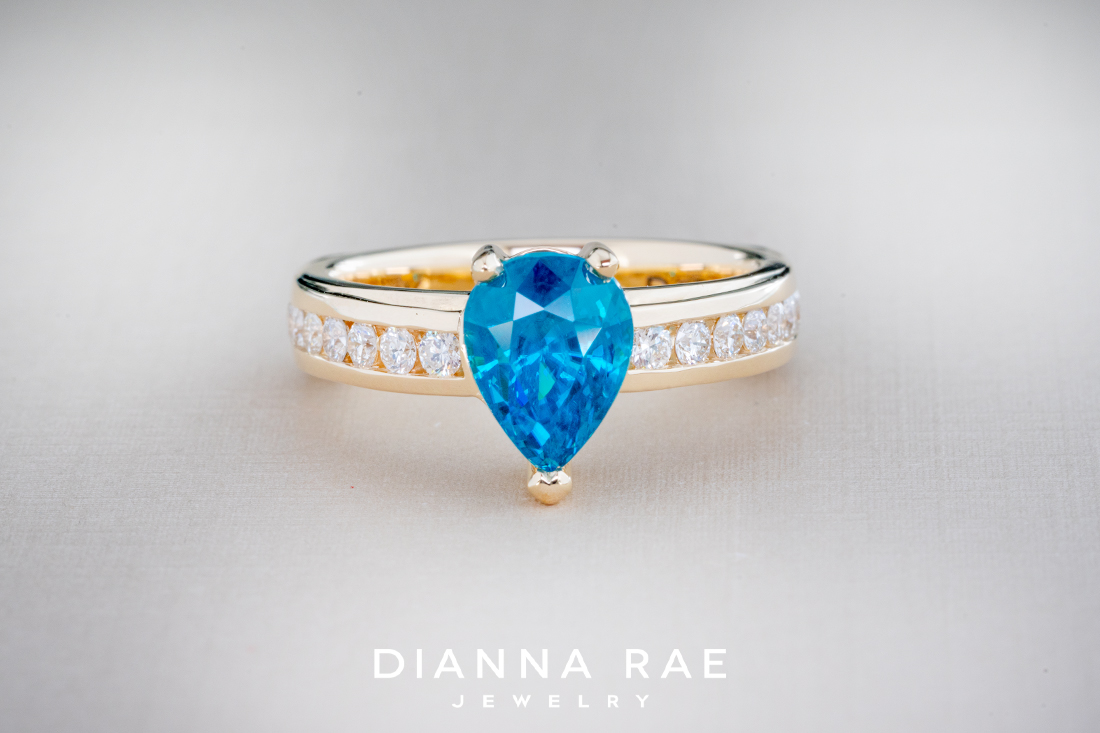Blue Zircon Ring with Diamond Channel Set Band