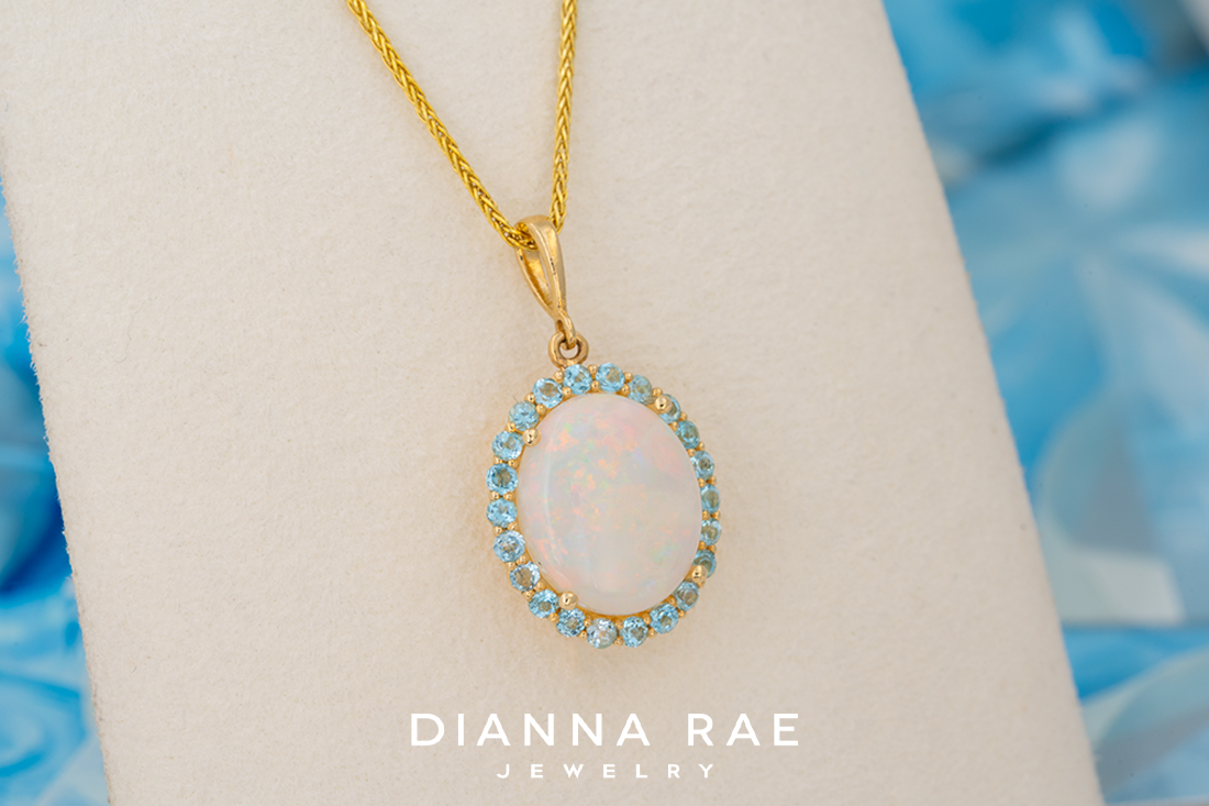 Opal Pendant with Blue Topaz Accents